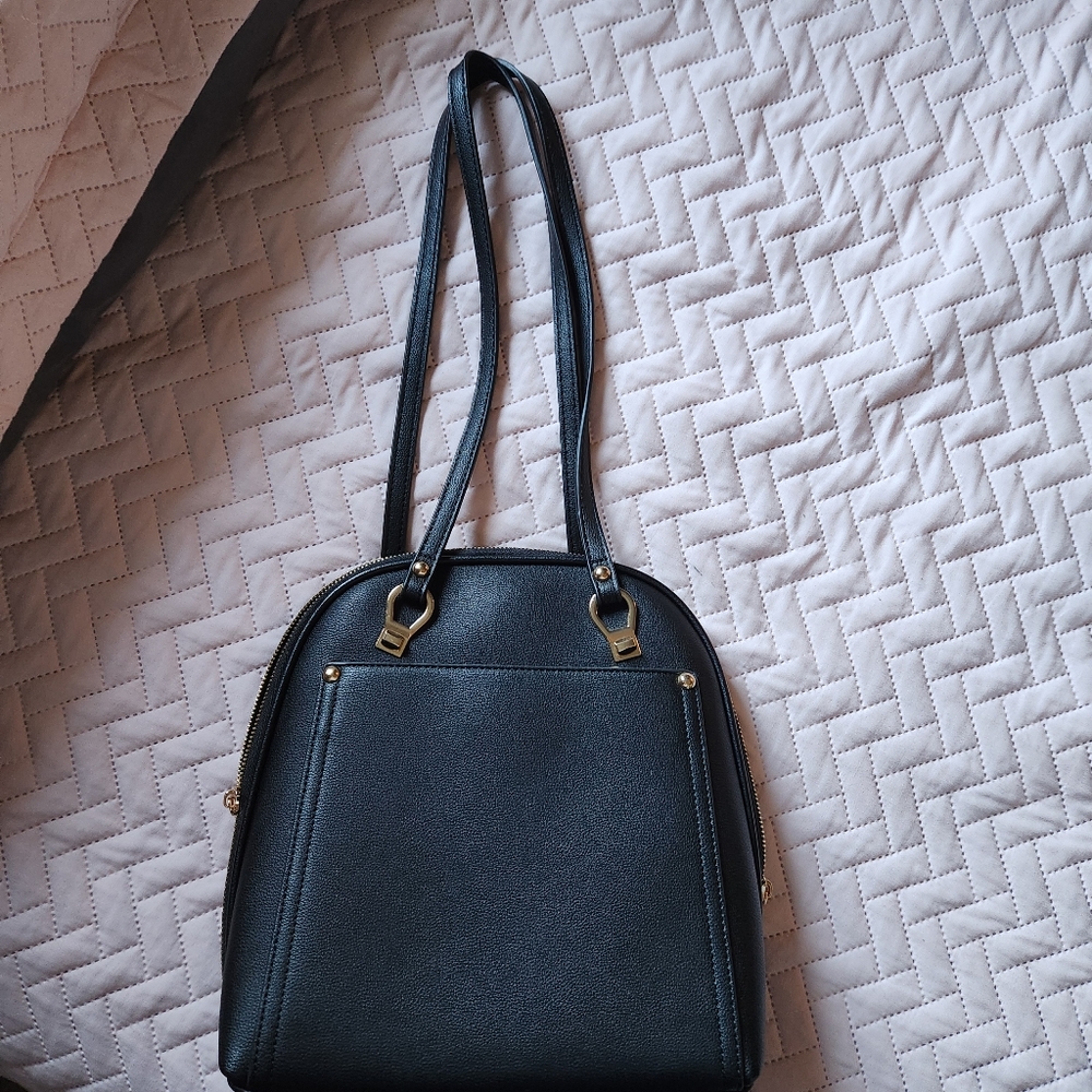 Chic Black Handbag with Gold Accents